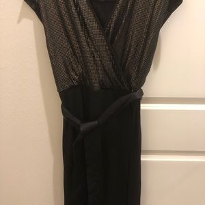 Black and gold sequence dress